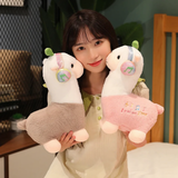 Woman holding a gray and a pink alpaca plush with music headphones and leaf sprouts