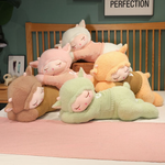 Group of sleeping sheep plush pillows in brown, pink, orange, green and white stacked on a bed