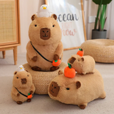 Group of capybara plushies with white ducks and oranges on a woven stool