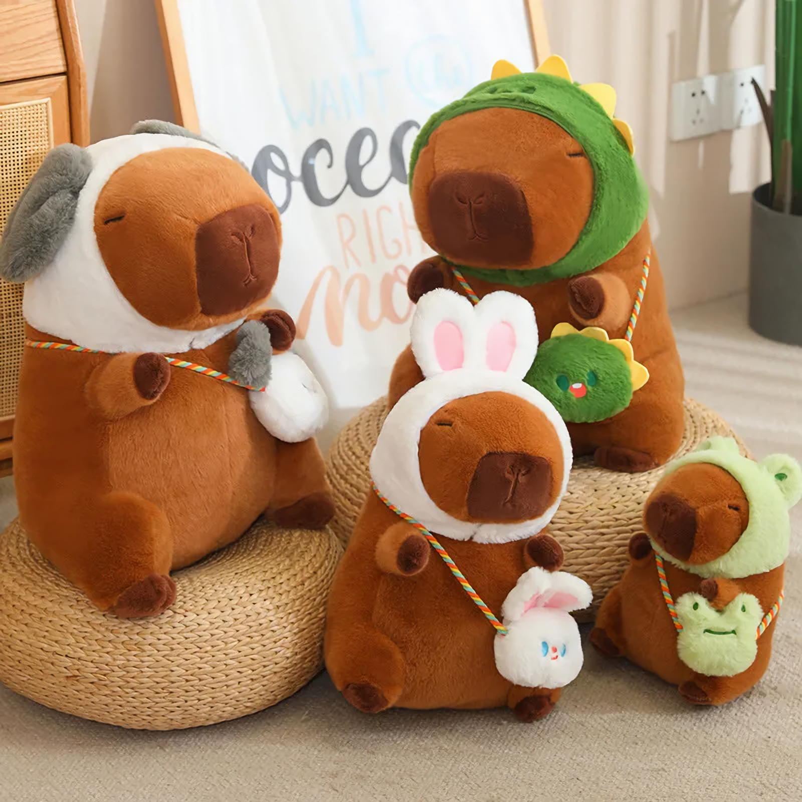 Capybara plushies in dog, dinosaur, rabbit and frog hoods on woven stools