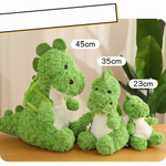 Size comparison of three green dinosaur plushies labeled 45cm, 35cm and 23cm