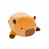 Chubby orange capybara plush pillow lying on a white background