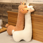 Brown and white long alpaca plush pillows leaning on a wooden headboard