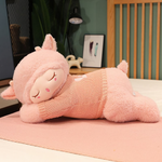 Pink sleeping sheep plush pillow with a knit sweater and a pink blush face