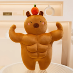 Front view of a muscle capybara plush with a small orange on its head