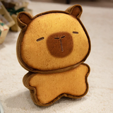 Dark brown bread capybara plush with a tiny embroidered face