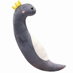 Curved gray sea lion plush body pillow with a yellow crown on a white background