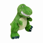 Green T-Rex dinosaur plush with a wide toothy smile and pale green belly, sitting against a plain background.