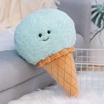 Blue ice cream cone plush pillow with a smiling face and a quilted waffle cone