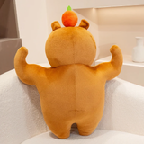 Back view of a muscle capybara plush with flexed arms on a sofa
