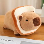 Capybara plush in a bread slice costume on a wooden table