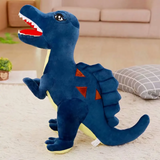 Blue Spinosaurus dinosaur plush with a sail on its back on a rug