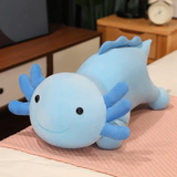 Blue axolotl plush pillow with blue gills and a smiling face