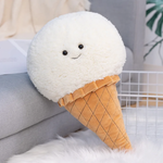 White ice cream cone plush pillow with a smiling face and a quilted waffle cone