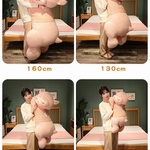 Size comparison of a pink sheep plush pillow with cm labels held by two people
