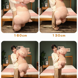 Size comparison of a pink sheep plush pillow with cm labels held by two people