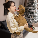 A person in a light shirt holds a plush dinosaur toy, expressing surprise in a cozy indoor setting.