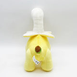 Plush toy shaped like a dinosaur with a banana design, featuring a yellow body and white details.