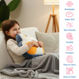 Child on a couch holding a plush pillow with a gray blanket, icons and text on the side.