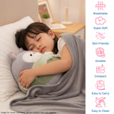 Child sleeping with a plush pillow and blanket, icons describing product features on the side.