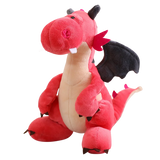 Red plush dragon with black wings, a round head, and a soft body, sitting upright.