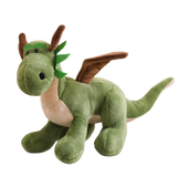 A green plush dragon with wings, large eyes, and a friendly expression, sitting on a flat surface.