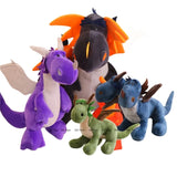 A group of colorful plush dragons and dinosaurs in various sizes and designs, featuring wings and playful expressions.