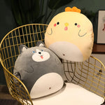 Two plush pillows shaped like a gray dog and a yellow chick on a wire chair.